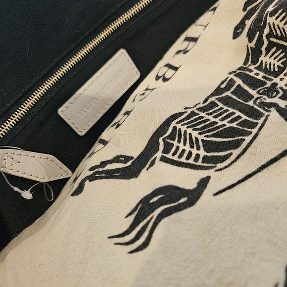 Burberry is a little over-sized crossbody with a top handle bag. Rarely used. - Picture 7 of 7